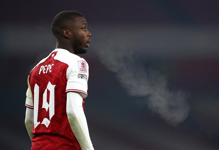 Nicolas Pepe Arsenal LONDON, ENGLAND - JANUARY 09: Nicolas Pepe of Arsenal looks on during the FA Cup Third Round match between Arsenal and Newcastle United at Emirates Stadium on January 09, 2021 in London, England. The match will be played without fans, behind closed doors as a Covid-19 precaution. (Photo by Julian Finney/Getty Images)