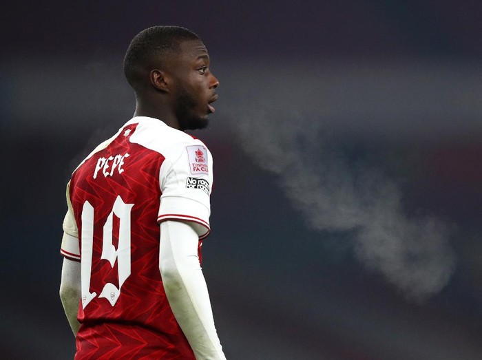 LONDON, ENGLAND - JANUARY 09: Nicolas Pepe of Arsenal looks on during the FA Cup Third Round match between Arsenal and Newcastle United at Emirates Stadium on January 09, 2021 in London, England. The match will be played without fans, behind closed doors as a Covid-19 precaution. (Photo by Julian Finney/Getty Images)