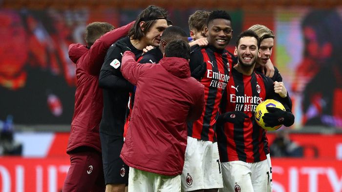 ac milan vs torino ac milan coppa italia MILAN, ITALY - JANUARY 12: Hakan Calhanoglu of A.C. Milan celebrates with Rafael Leao after scoring the winning penalty during a penalty shoot out during the Coppa Italia match between AC Milan and Torino FC at Stadio Giuseppe Meazza on January 12, 2021 in Milan, Italy. Sporting stadiums around Italy remain under strict restrictions due to the Coronavirus Pandemic as Government social distancing laws prohibit fans inside venues resulting in games being played behind closed doors. (Photo by Marco Luzzani/Getty Images)
