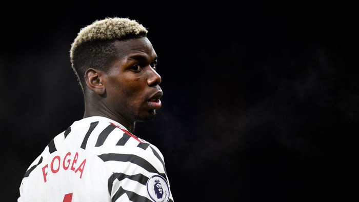 BURNLEY, ENGLAND - JANUARY 12: Paul Pogba of Manchester United looks on during the Premier League match between Burnley and Manchester United at Turf Moor on January 12, 2021 in Burnley, England. Sporting stadiums around England remain under strict restrictions due to the Coronavirus Pandemic as Government social distancing laws prohibit fans inside venues resulting in games being played behind closed doors. (Photo by Peter Powell - Pool/Getty Images)