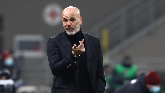 MILAN, ITALY - JANUARY 12: Stefano Pioli, Head Coach of A.C. Milan reacts during the Coppa Italia match between AC Milan and Torino FC at Stadio Giuseppe Meazza on January 12, 2021 in Milan, Italy. Sporting stadiums around Italy remain under strict restrictions due to the Coronavirus Pandemic as Government social distancing laws prohibit fans inside venues resulting in games being played behind closed doors. (Photo by Marco Luzzani/Getty Images)