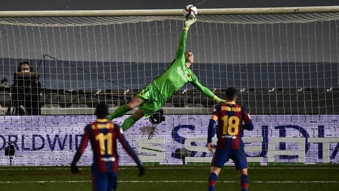 Marc-Andre ter Stegen Barcelonas goalkeeper Marc-Andre ter Stegen makes a save during Spanish Super Cup semi final soccer match between Barcelona and Real Sociedad at Nuevo Arcangel stadium in Cordoba, Spain, Wednesday, Jan. 13, 2021. (AP Photo/Jose Breton)