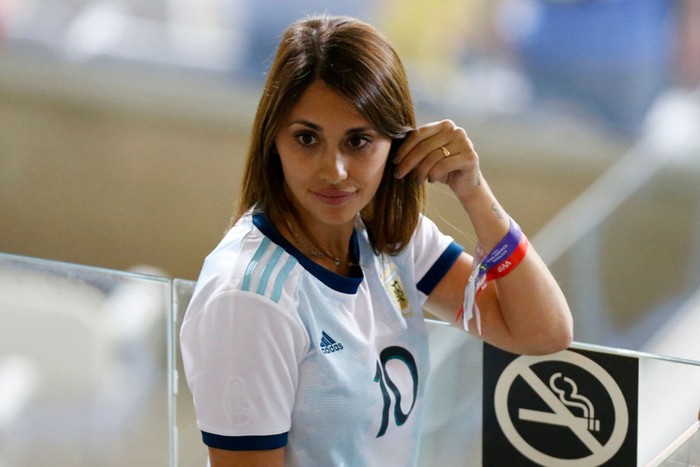 BELO HORIZONTE, BRAZIL - JULY 02: Antonella Roccuzzo wife of Lionel Messi looks on from the stands prior to the Copa America Brazil 2019 Semi Final match between Brazil and Argentina at Mineirao Stadium on July 02, 2019 in Belo Horizonte, Brazil. (Photo by Felipe Oliveira/Getty Images)