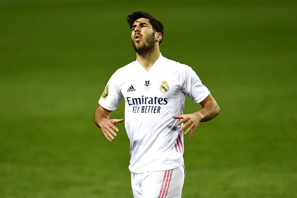 Real Madrid's Marco Asensio gestures during Spanish Super Cup semi final soccer match between Real Madrid and Athletic Bilbao at La Rosaleda stadium in Malaga, Spain, Thursday, Jan. 14, 2021. (AP Photo/Jose Breton)