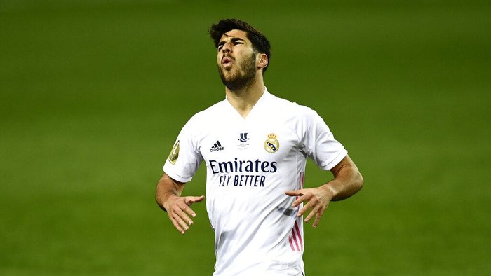 Real Madrids Marco Asensio gestures during Spanish Super Cup semi final soccer match between Real Madrid and Athletic Bilbao at La Rosaleda stadium in Malaga, Spain, Thursday, Jan. 14, 2021. (AP Photo/Jose Breton)