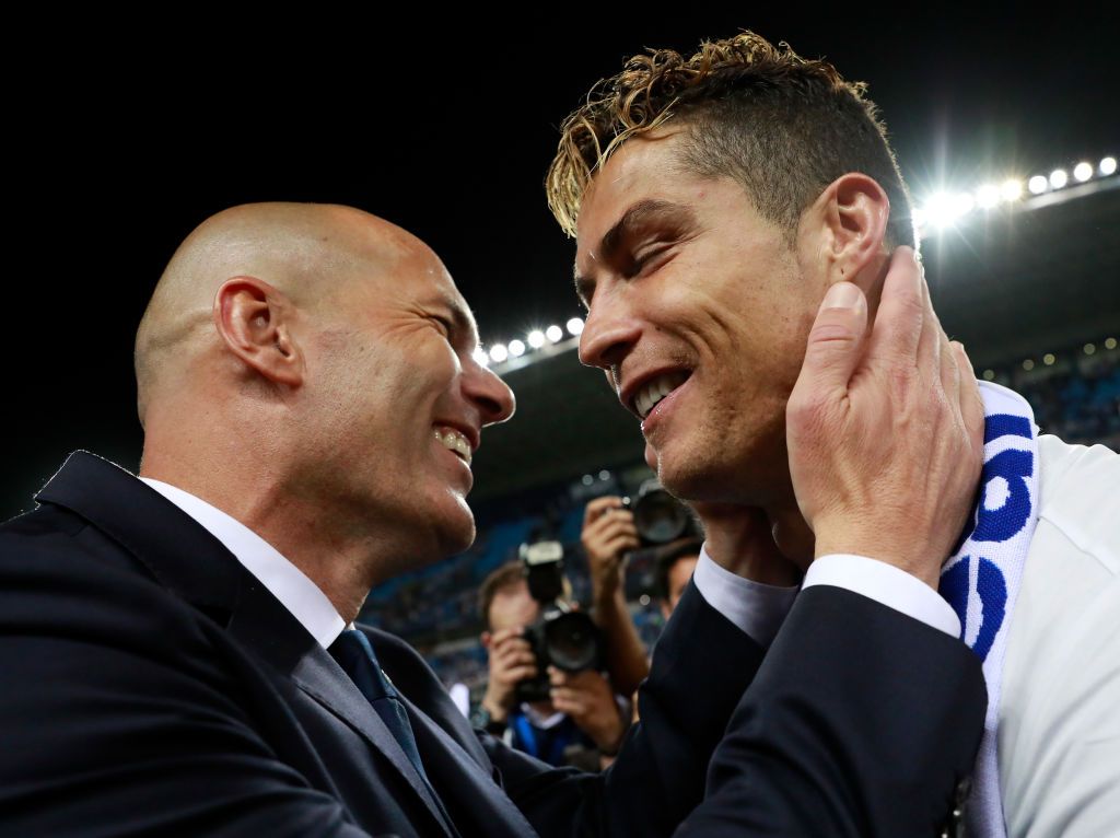 MALAGA, SPAIN - MAY 21:  Zinedine Zidane, Manager of Real Madrid celebrates with Cristiano Ronaldo after being crowned champions following the La Liga match between Malaga and Real Madrid at La Rosaleda Stadium on May 21, 2017 in Malaga, Spain.  (Photo by Gonzalo Arroyo Moreno/Getty Images)
