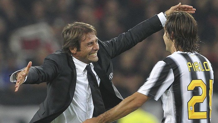 TURIN, ITALY - OCTOBER 02:  Juventus FC manager Antonio Conte celebrates the victory with Andrea Pirlo at the end of the Serie A match between Juventus FC and AC Milan on October 2, 2011 in Turin, Italy.  (Photo by Marco Luzzani/Getty Images)