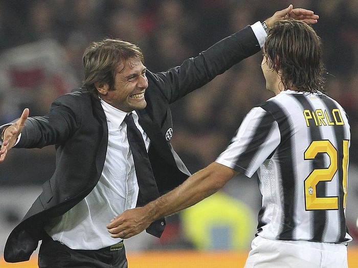 TURIN, ITALY - OCTOBER 02:  Juventus FC manager Antonio Conte celebrates the victory with Andrea Pirlo at the end of the Serie A match between Juventus FC and AC Milan on October 2, 2011 in Turin, Italy.  (Photo by Marco Luzzani/Getty Images)