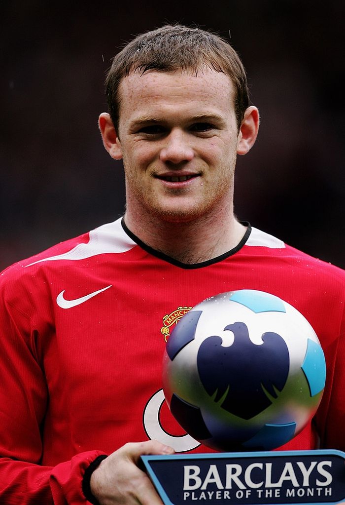 MANCHESTER, UNITED KINGDOM - APRIL 09:  Wayne Rooney of Manchester United poses with his Barclays Player of the Month Award prior to the Barclays Premiership match between Manchester United and Arsenal at Old Trafford on April 9, 2006 in Manchester, England.  (Photo by Alex Livesey/Getty Images)