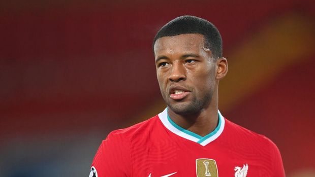 LIVERPOOL, ENGLAND - DECEMBER 01: Georginio Wijnaldum of Liverpool looks on during the UEFA Champions League Group D stage match between Liverpool FC and Ajax Amsterdam at Anfield on December 01, 2020 in Liverpool, England. Sporting stadiums around the UK remain under strict restrictions due to the Coronavirus Pandemic as Government social distancing laws prohibit fans inside venues resulting in games being played behind closed doors. (Photo by Michael Regan/Getty Images)