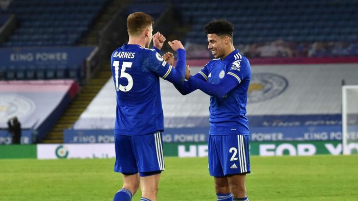 Leicester City, Southampton LEICESTER, ENGLAND - JANUARY 16: Harvey Barnes of Leicester City celebrates with teammate James Justin after scoring their teams second goal during the Premier League match between Leicester City and Southampton at The King Power Stadium on January 16, 2021 in Leicester, England. Sporting stadiums around England remain under strict restrictions due to the Coronavirus Pandemic as Government social distancing laws prohibit fans inside venues resulting in games being played behind closed doors. (Photo by Rui Vieira - Pool/Getty Images)