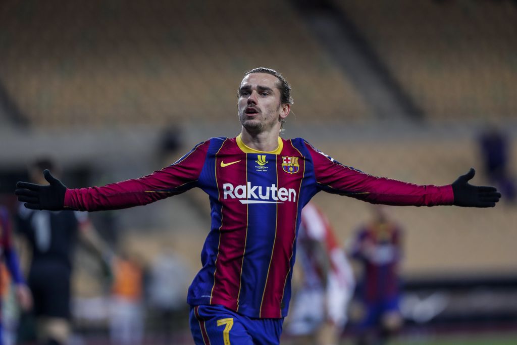 Barcelona's Antoine Griezmann celebrates after scoring his second goal during the Spanish Supercopa final soccer match between FC Barcelona and Athletic Bilbao at La Cartuja stadium in Seville, Spain, Sunday, Jan. 17, 2021. (AP Photo/Miguel Morenatti)