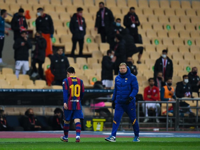 SEVILLE, SPAIN - JANUARY 17: Lionel Messi of Barcelona walks off the field after being shown a red card during the Supercopa de Espana Final match between FC Barcelona and Athletic Club at Estadio de La Cartuja on January 17, 2021 in Seville, Spain. Sporting stadiums around Spain remain under strict restrictions due to the Coronavirus Pandemic as Government social distancing laws prohibit fans inside venues resulting in games being played behind closed doors.  (Photo by David Ramos/Getty Images)