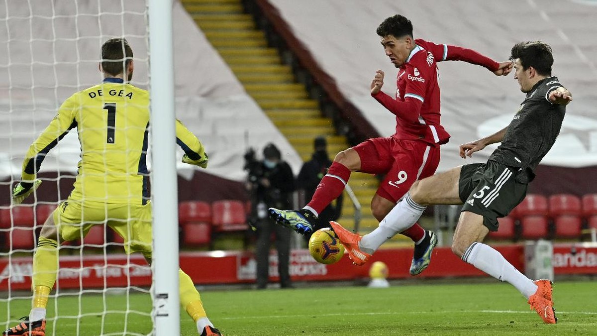 Laga Liverpool vs Manchester United selesai dengan skor 0-0 (Foto: AP/Paul Ellis)