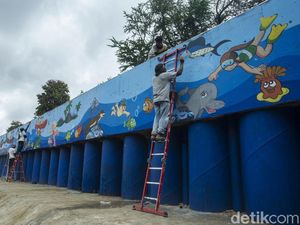 Mural Kehidupan Sungai Percantik Kali Ciliwung