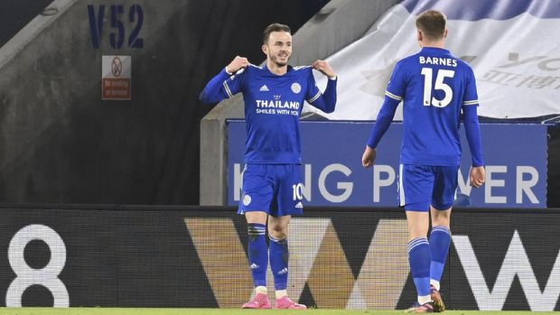 Leicester's James Maddison celebrates after scoring his team's second goal during the English Premier League soccer match between Leicester City and Chelsea at the King Power Stadium in Leicester, England, Tuesday, Jan. 19, 2021. (Michael Regan/Pool via AP)