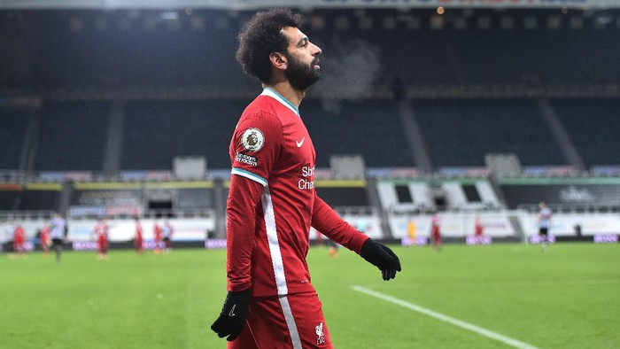 NEWCASTLE UPON TYNE, ENGLAND - DECEMBER 30: Mohamed Salah of Liverpool looks on during the Premier League match between Newcastle United and Liverpool at St. James Park on December 30, 2020 in Newcastle upon Tyne, England. The match will be played without fans, behind closed doors as a Covid-19 precaution. (Photo by Peter Powell - Pool/Getty Images)