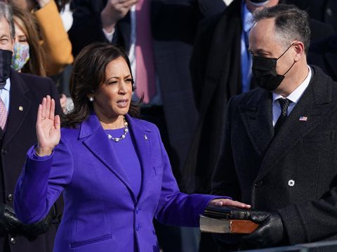 Kamala Harris is sworn in as U.S. Vice President as her spouse Doug Emhoff holds a bible during the inauguration of Joe Biden as the 46th President of the United States on the West Front of the U.S. Capitol in Washington, U.S., January 20, 2021. REUTERS/Kevin Lamarque