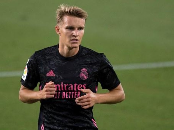 Real Madrid's Norwegian midfielder Martin Odegaard reacts during the Spanish league football match Real Betis against Real Madrid CF at the Benito Villamarin stadium in Seville on September 26, 2020. (Photo by JORGE GUERRERO / AFP)