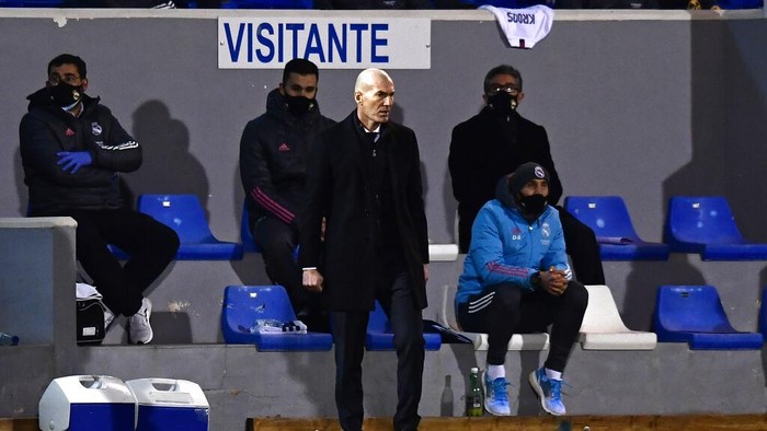 Real Madrids head coach Zinedine Zidane watches the play during a Spanish Copa del Rey round of 32 soccer match between Alcoyano and Real Madrid at the El Collao stadium in Alcoy, Spain, Wednesday Jan. 20, 2021. (AP Photo/Jose Breton)