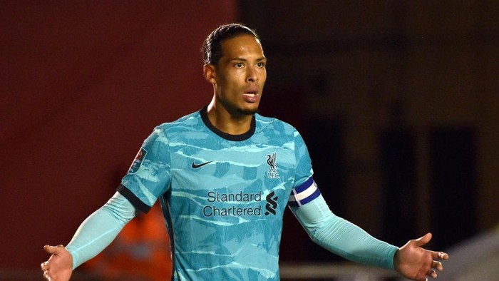 LINCOLN, ENGLAND - SEPTEMBER 24: Virgil van Dijk of Liverpool reacts during the Carabao Cup third round match between Lincoln City and Liverpool at Sincil Bank Stadium on September 24, 2020 in Lincoln, England. Football Stadiums around United Kingdom remain empty due to the Coronavirus Pandemic as Government social distancing laws prohibit fans inside venues resulting in fixtures being played behind closed doors. (Photo by Rui Vieira - Pool/Getty Images)