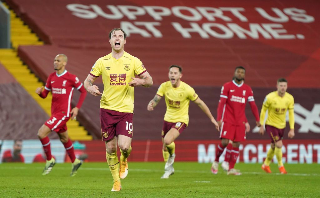 LIVERPOOL, ENGLAND - JANUARY 21: Ashley Barnes of Burnley celebrates after scoring their team's first goal from the penalty spot during the Premier League match between Liverpool and Burnley at Anfield on January 21, 2021 in Liverpool, England. Sporting stadiums around the UK remain under strict restrictions due to the Coronavirus Pandemic as Government social distancing laws prohibit fans inside venues resulting in games being played behind closed doors. (Photo by Jon Super - Pool/Getty Images)