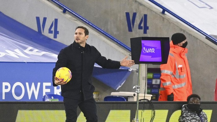 Chelseas head coach Frank Lampard waits for the VAR system to be reviewed by the referee during the English Premier League soccer match between Leicester City and Chelsea at the King Power Stadium in Leicester, England, Tuesday, Jan. 19, 2021 (Michael Regan/Pool via AP)