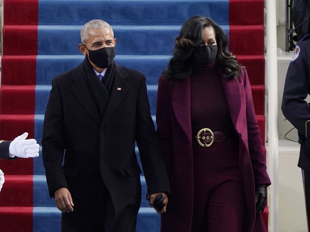 Mantan Presiden Amerika Barrack Obama dan istrinya Michelle Obama saat menghadiri pelantikan Presiden Amerika yang baru Joe Biden dan Kamala Harris.