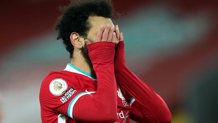LIVERPOOL, ENGLAND - JANUARY 21: Mohamed Salah of Liverpool reacts during the Premier League match between Liverpool and Burnley at Anfield on January 21, 2021 in Liverpool, England. Sporting stadiums around the UK remain under strict restrictions due to the Coronavirus Pandemic as Government social distancing laws prohibit fans inside venues resulting in games being played behind closed doors. (Photo by Clive Brunskill/Getty Images)