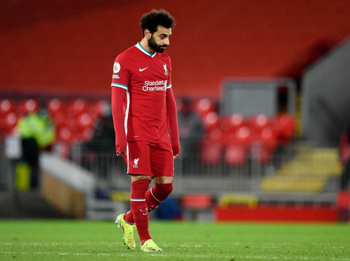 LIVERPOOL, ENGLAND - JANUARY 21: Mohamed Salah of Liverpool reacts during the Premier League match between Liverpool and Burnley at Anfield on January 21, 2021 in Liverpool, England. Sporting stadiums around the UK remain under strict restrictions due to the Coronavirus Pandemic as Government social distancing laws prohibit fans inside venues resulting in games being played behind closed doors. (Photo by Peter Powell - Pool/Getty Images)