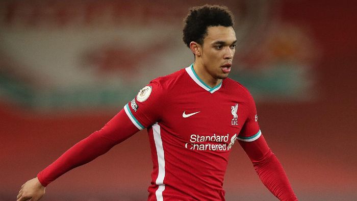 Trent Alexander Arnold LIVERPOOL, ENGLAND - JANUARY 21: Trent Alexander-Arnold of Liverpool in action during the Premier League match between Liverpool and Burnley at Anfield on January 21, 2021 in Liverpool, England. Sporting stadiums around the UK remain under strict restrictions due to the Coronavirus Pandemic as Government social distancing laws prohibit fans inside venues resulting in games being played behind closed doors. (Photo by Clive Brunskill/Getty Images)