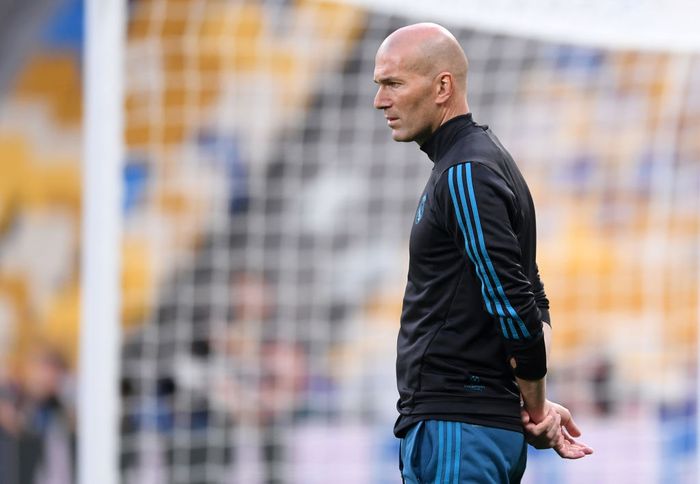 Zinedine Zidane KIEV, UKRAINE - MAY 25: Zinedine Zidane, Manager of Real Madrid looks on during a Real Madrid training session ahead of the UEFA Champions League Final against Liverpool at NSC Olimpiyskiy Stadium on May 25, 2018 in Kiev, Ukraine. (Photo by Laurence Griffiths/Getty Images)