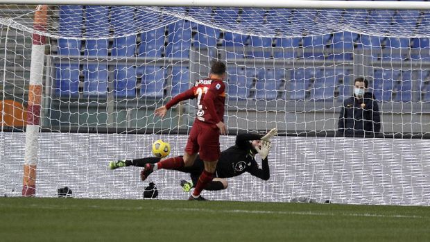 Roma's Borja Mayoral scores his side's opening goal during the Serie A soccer match between Roma and Spezia at the Rome Olympic Stadium Saturday, Jan. 23, 2021. (AP Photo/Gregorio Borgia)
