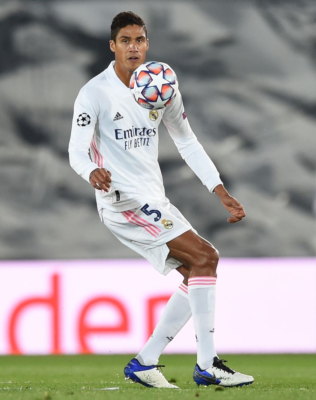 MADRID, SPAIN - OCTOBER 21: Raphael Varane of Real Madrid CF controls the ball during the UEFA Champions League Group B stage match between Real Madrid and Shakhtar Donetsk at Estadio Alfredo De Stefano on October 21, 2020 in Madrid, Spain. (Photo by Denis Doyle/Getty Images)