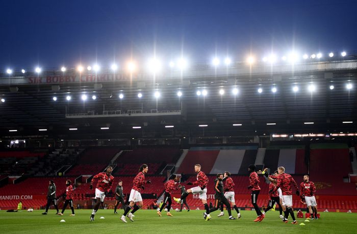 Manchester United MANCHESTER, ENGLAND - JANUARY 24: The Manchester United team warm up ahead of The Emirates FA Cup Fourth Round match between Manchester United and Liverpool at Old Trafford on January 24, 2021 in Manchester, England. Sporting stadiums around the UK remain under strict restrictions due to the Coronavirus Pandemic as Government social distancing laws prohibit fans inside venues resulting in games being played behind closed doors. (Photo by Laurence Griffiths/Getty Images)
