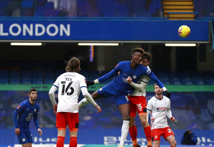 Chelseas Tammy Abraham, third left, scores his sides second goal during the English FA Cup fourth round soccer match between Chelsea and Luton Town at Stamford Bridge Stadium in London, Sunday, Jan. 24, 2021. (AP Photo/Ian Walton)