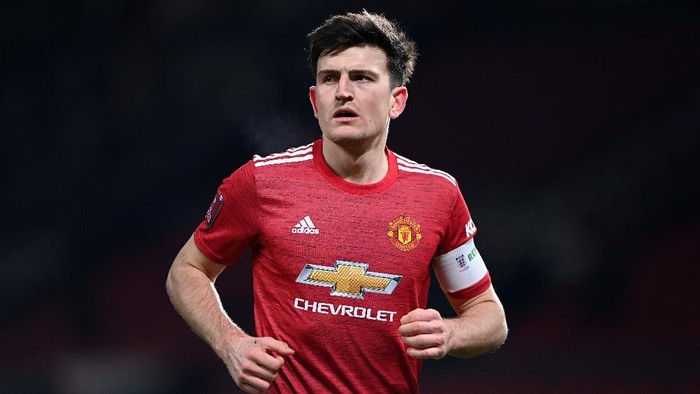 MANCHESTER, ENGLAND - JANUARY 24: Harry Maguire of Manchester United looks on during The Emirates FA Cup 4th Round match between Manchester United and Liverpool at Old Trafford on January 24, 2021 in Manchester, England. Sporting stadiums around the UK remain under strict restrictions due to the Coronavirus Pandemic as Government social distancing laws prohibit fans inside venues resulting in games being played behind closed doors. (Photo by Laurence Griffiths/Getty Images)