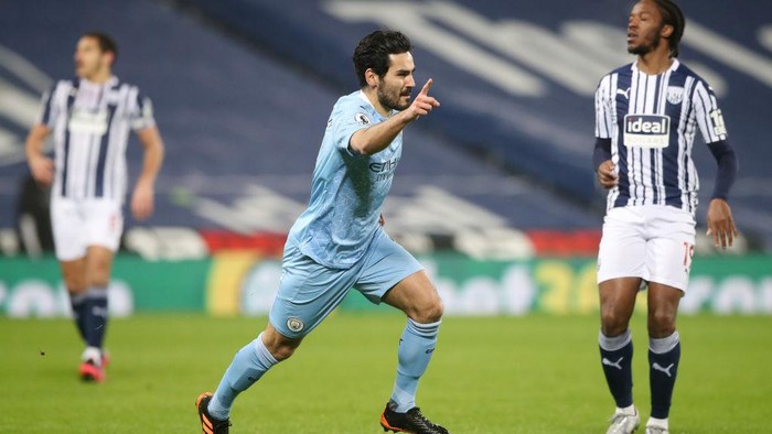 WEST BROMWICH, ENGLAND - JANUARY 26: Ilkay Guendogan of Manchester City celebrates after scoring their teams firs goal  during the Premier League match between West Bromwich Albion and Manchester City at The Hawthorns on January 26, 2021 in West Bromwich, England. Sporting stadiums around the UK remain under strict restrictions due to the Coronavirus Pandemic as Government social distancing laws prohibit fans inside venues resulting in games being played behind closed doors. (Photo by Nick Potts - Pool/Getty Images)