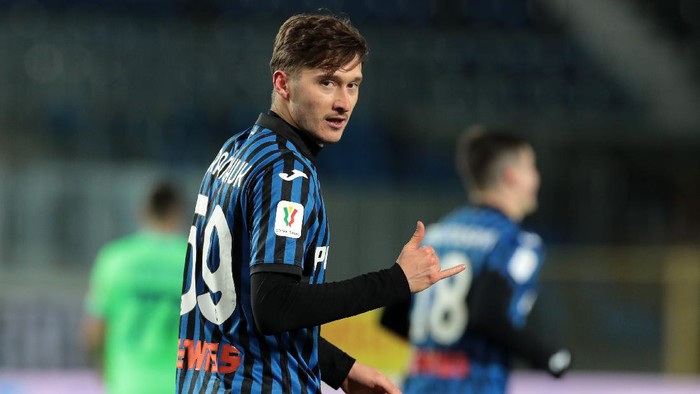 BERGAMO, ITALY - JANUARY 27: Aleksej Miranchuk of Atalanta B.C. celebrates after scoring their sides third goal  during the Coppa Italia match between Atalanta BC and SS Lazio at Gewiss Stadium on January 27, 2021 in Bergamo, Italy. Sporting stadiums around Italy remain under strict restrictions due to the Coronavirus Pandemic as Government social distancing laws prohibit fans inside venues resulting in games being played behind closed doors. (Photo by Emilio Andreoli/Getty Images)