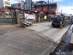 Perbaikan Kelar, Jl Caman Raya Bekasi Dilewati Kendaraan dengan Lancar