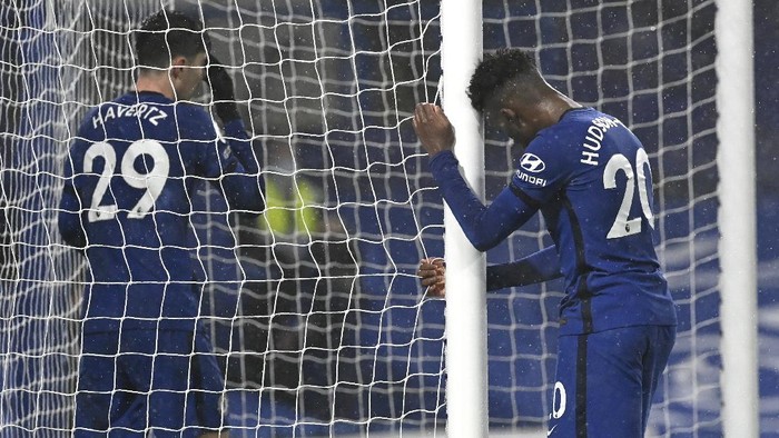 Chelseas Callum Hudson-Odoi and Chelseas Kai Havertz react during the English Premier League soccer match between Chelsea and Wolverhampton Wanderers at Stamford Bridge Stadium in London, England, Wednesday, Jan. 27, 2021. (Neil Hall/Pool via AP)