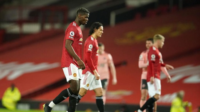 MANCHESTER, ENGLAND - JANUARY 27: Paul Pogba of Manchester United looks on following the Premier League match between Manchester United and Sheffield United at Old Trafford on January 27, 2021 in Manchester, England. Sporting stadiums around the UK remain under strict restrictions due to the Coronavirus Pandemic as Government social distancing laws prohibit fans inside venues resulting in games being played behind closed doors. (Photo by Dave Thompson - Pool/Getty Images)