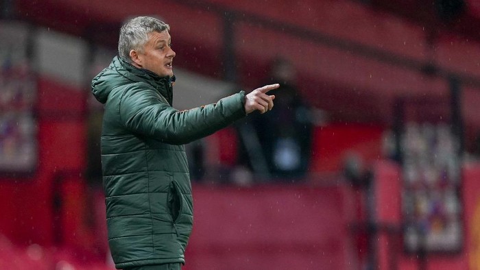 Manchester Uniteds manager Ole Gunnar Solskjaer gestures during the English Premier League soccer match between Manchester United and Sheffield United at Old Trafford, Manchester, England, Wednesday, Jan. 27, 2021. (AP Photo/Tim Keeton,Pool)