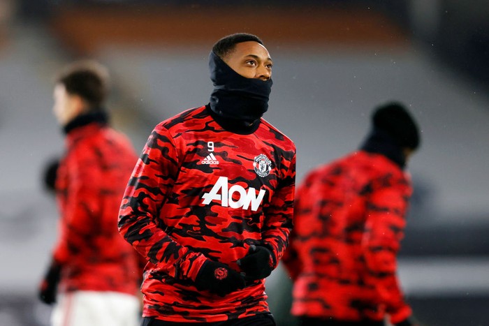 LONDON, ENGLAND - JANUARY 20: Anthony Martial of Manchester United warms up prior to the Premier League match between Fulham and Manchester United at Craven Cottage on January 20, 2021 in London, England. Sporting stadiums around the UK remain under strict restrictions due to the Coronavirus Pandemic as Government social distancing laws prohibit fans inside venues resulting in games being played behind closed doors. (Photo by Adrian Dennis -