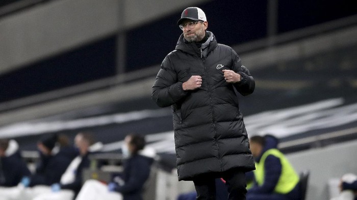 Liverpools manager Jurgen Klopp celebrates after his team scored during the English Premier League soccer match between Tottenham Hotspur and Liverpool at the Tottenham Hotspur Stadium in London, Thursday, Jan. 28, 2021. (Nick Potts/Pool via AP)