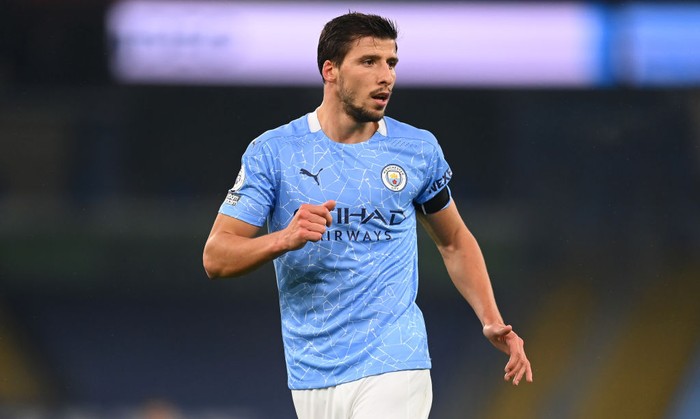 MANCHESTER, ENGLAND - NOVEMBER 28: Ruben Dias of Manchester City reacts during the Premier League match between Manchester City and Burnley at Etihad Stadium on November 28, 2020 in Manchester, England. Sporting stadiums around the UK remain under strict restrictions due to the Coronavirus Pandemic as Government social distancing laws prohibit fans inside venues resulting in games being played behind closed doors. (Photo by Michael Regan/Getty Images)