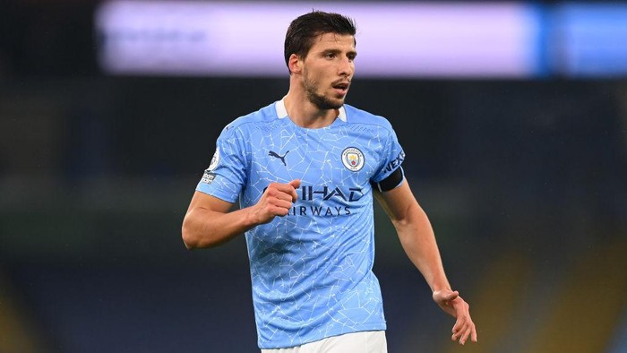 MANCHESTER, ENGLAND - NOVEMBER 28: Ruben Dias of Manchester City reacts during the Premier League match between Manchester City and Burnley at Etihad Stadium on November 28, 2020 in Manchester, England. Sporting stadiums around the UK remain under strict restrictions due to the Coronavirus Pandemic as Government social distancing laws prohibit fans inside venues resulting in games being played behind closed doors. (Photo by Michael Regan/Getty Images)