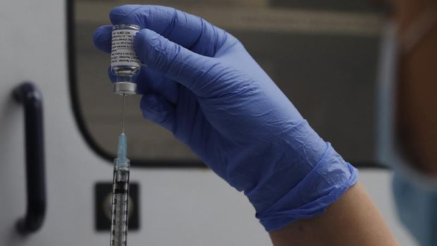 A dose of the Phase 3 Novavax coronavirus vaccine is seen ready for use in the trial at St. George's University hospital in London Wednesday, Oct. 7, 2020. Novavax Inc. said Thursday Jan. 28, 2021 that its COVID-19 vaccine appears 89% effective based on early findings from a British study and that it also seems to work — though not as well — against new mutated strains of the virus circulating in that country and South Africa. (AP Photo/Alastair Grant)