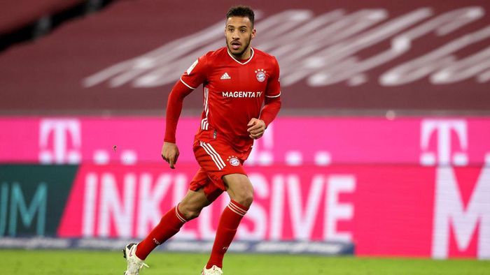 Corentin Tolisso MUNICH, GERMANY - DECEMBER 16: Corentin Tolisso of FC Bayern München runs with the ball during the Bundesliga match between FC Bayern Muenchen and VfL Wolfsburg at Allianz Arena on December 16, 2020 in Munich, Germany. (Photo by Alexander Hassenstein/Getty Images)