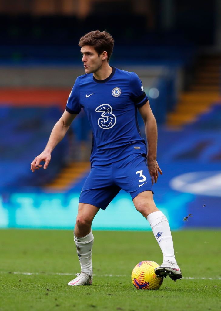 LONDON, ENGLAND - JANUARY 31: Marcos Alonso of Chelsea celebrates with team mate Christian Pulisic after scoring their side's second goal during the Premier League match between Chelsea and Burnley at Stamford Bridge on January 31, 2021 in London, England. Sporting stadiums around the UK remain under strict restrictions due to the Coronavirus Pandemic as Government social distancing laws prohibit fans inside venues resulting in games being played behind closed doors. (Photo by Andrew Couldridge - Pool/Getty Images)